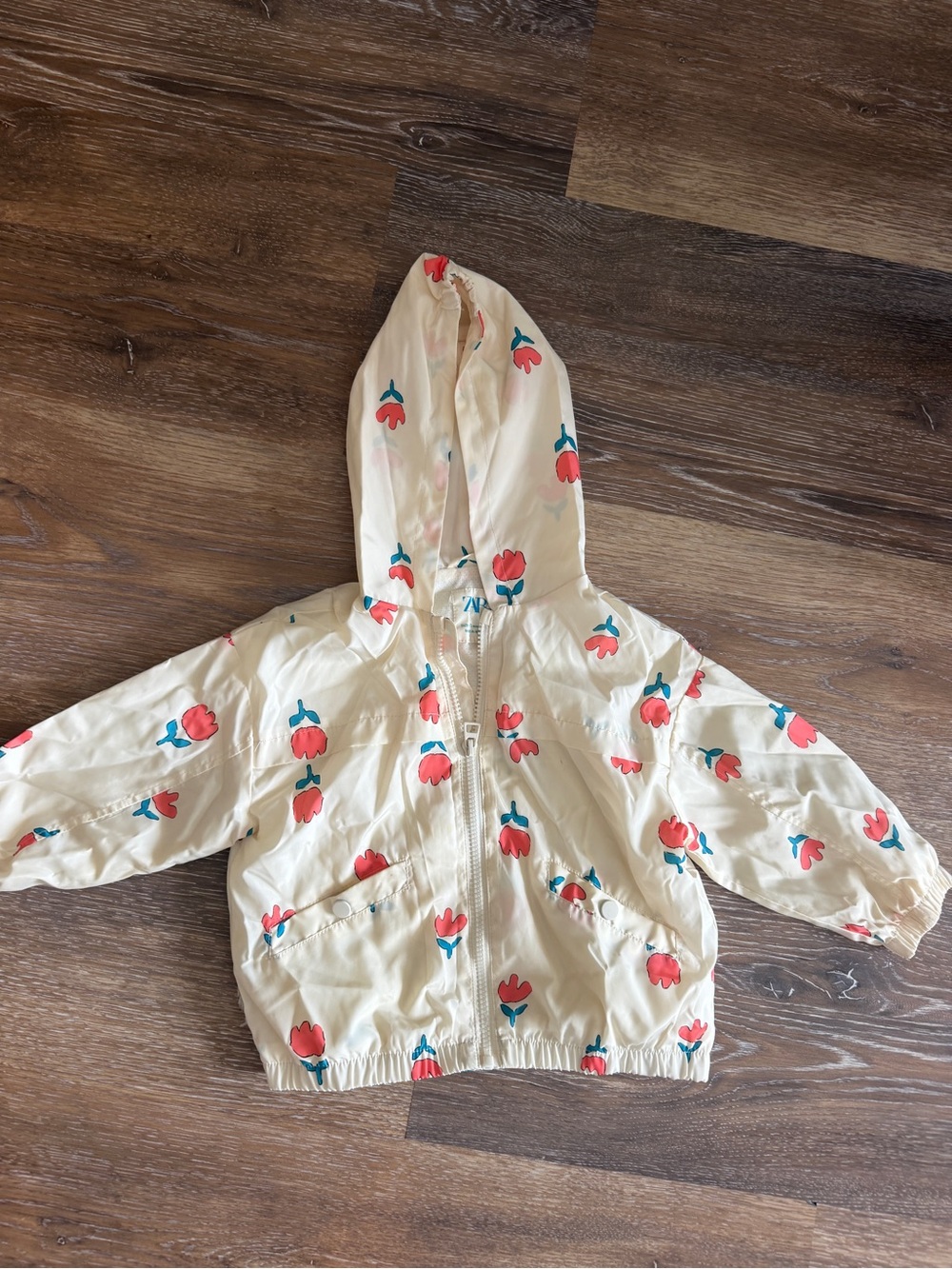 Zara Cream Hooded Raincoat with Red and Teal Floral Print
